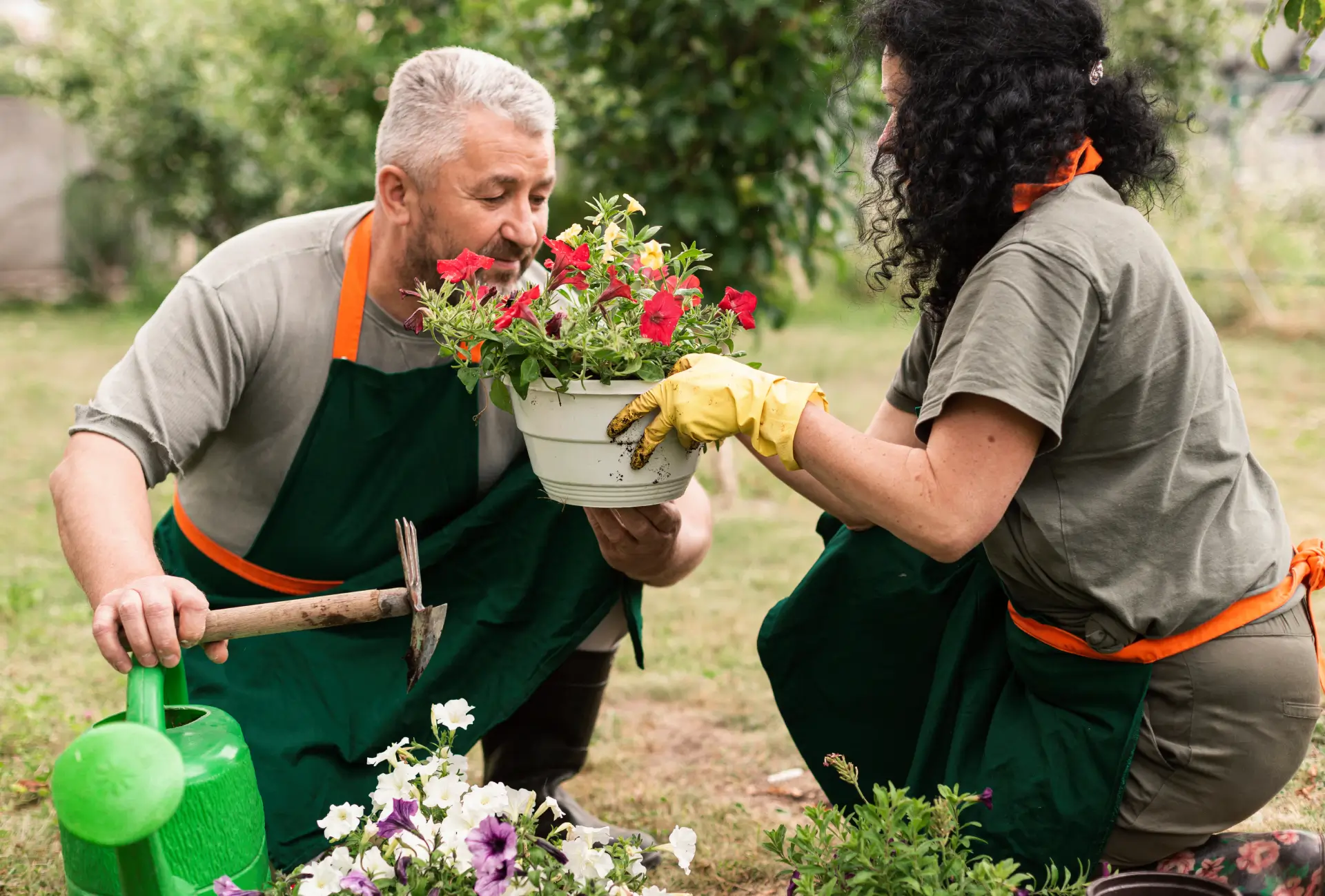 Happy Senior Couple With Flowers
