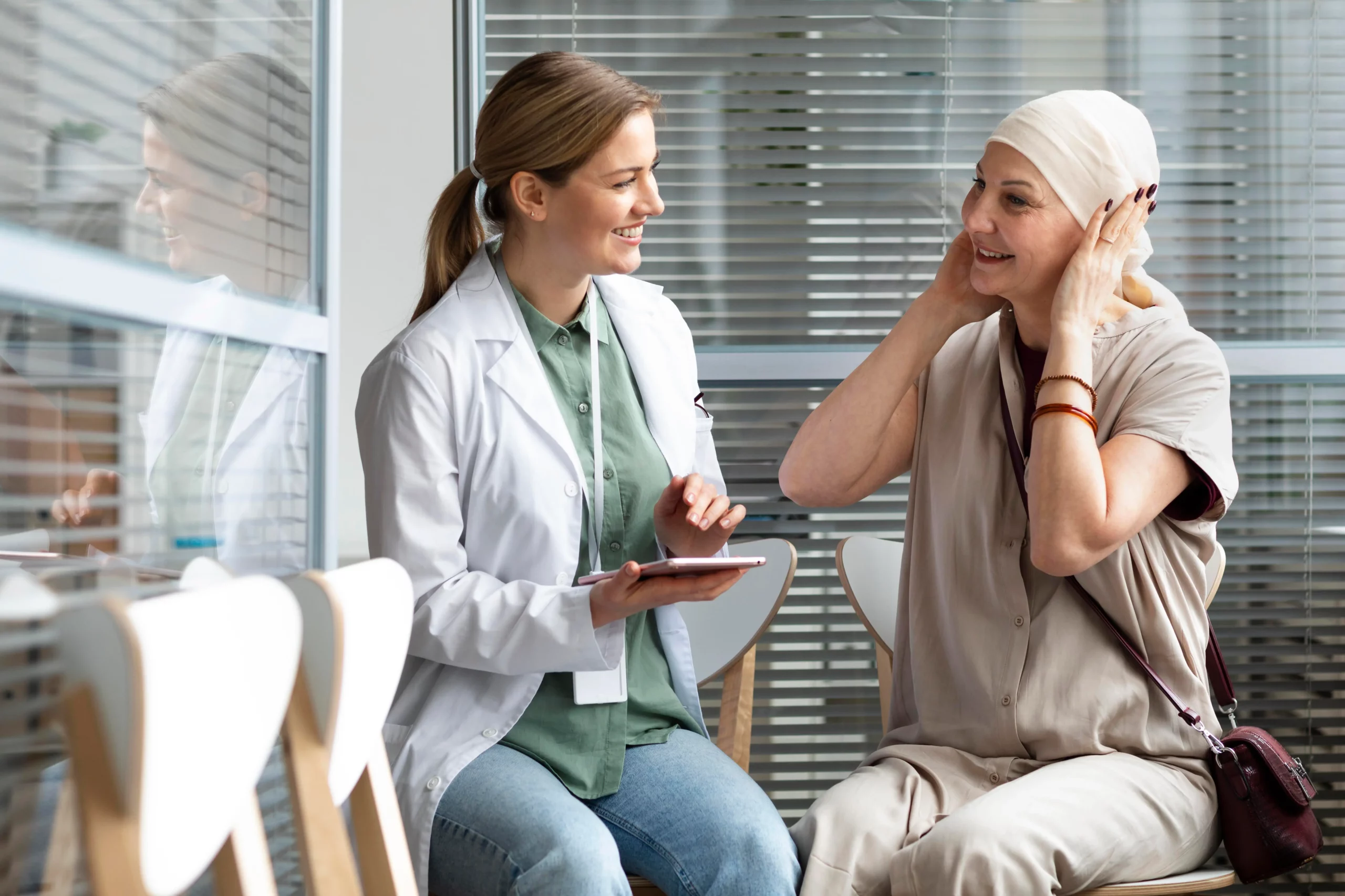 Middle Aged Woman With Skin Cancer Talking With Her Doctor